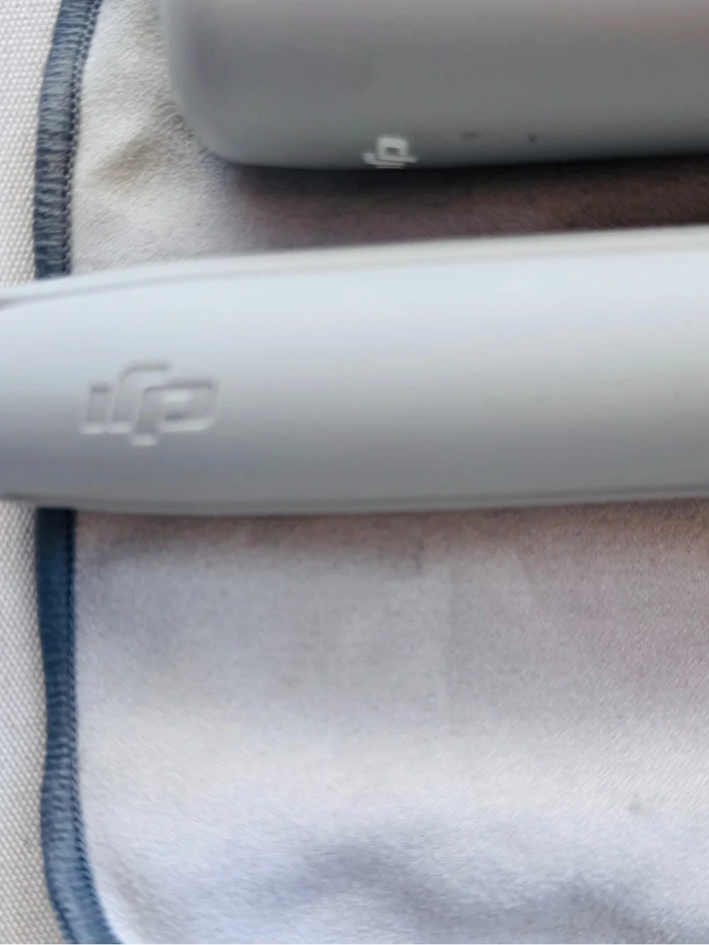DJI Light Gray Handheld Smartphone Gimbal with Tripod